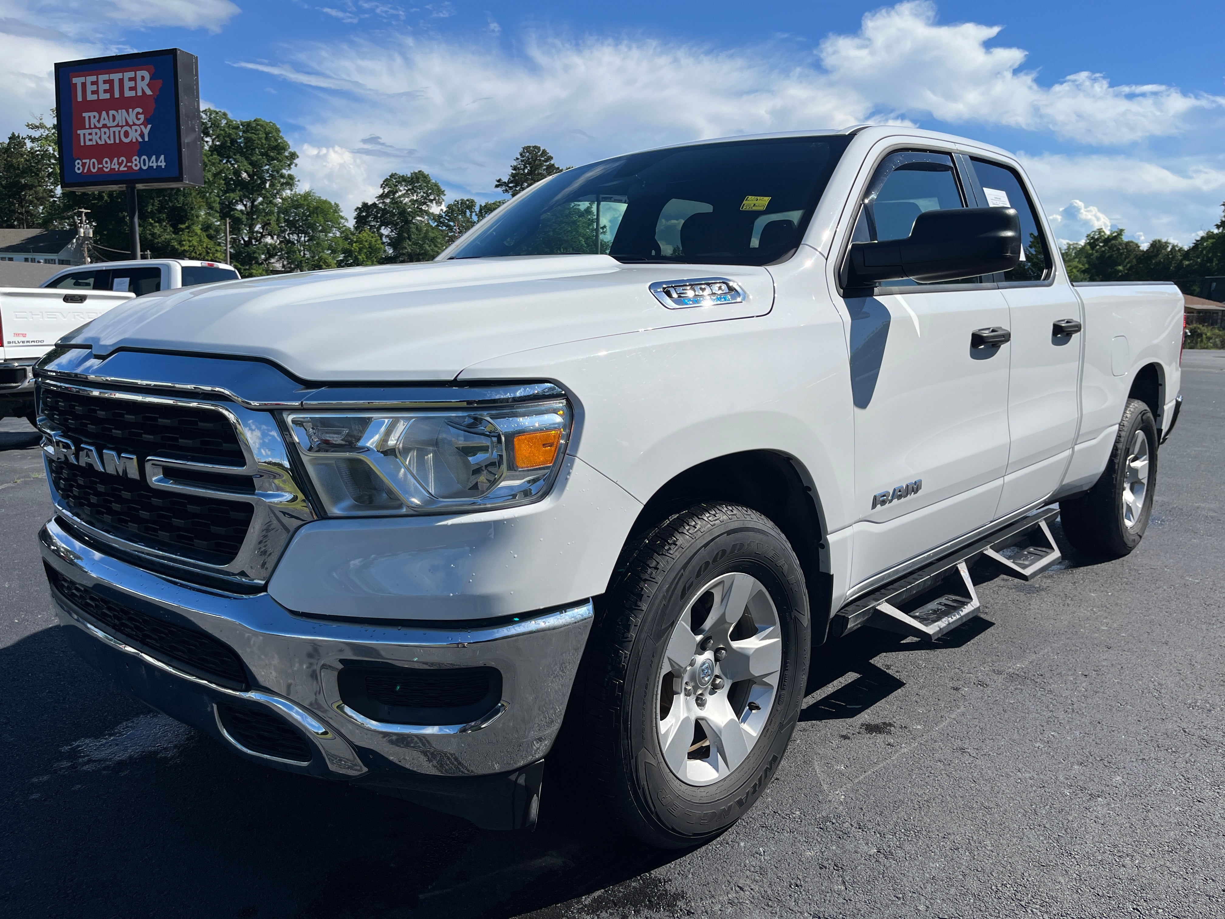 2023 RAM 1500 Big Horn in White — front three-quarter view