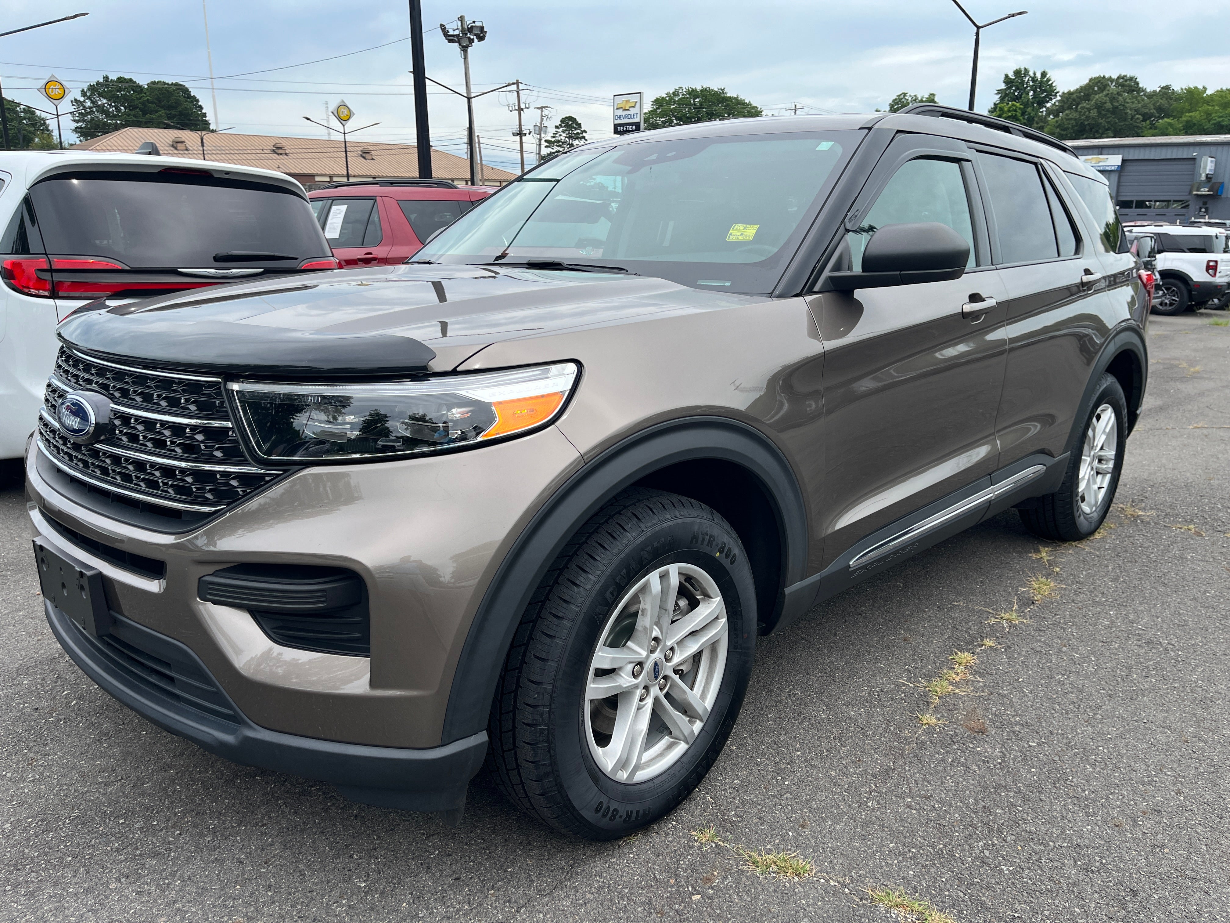 2021 Ford Explorer XLT in Stone Gray — front three-quarter view