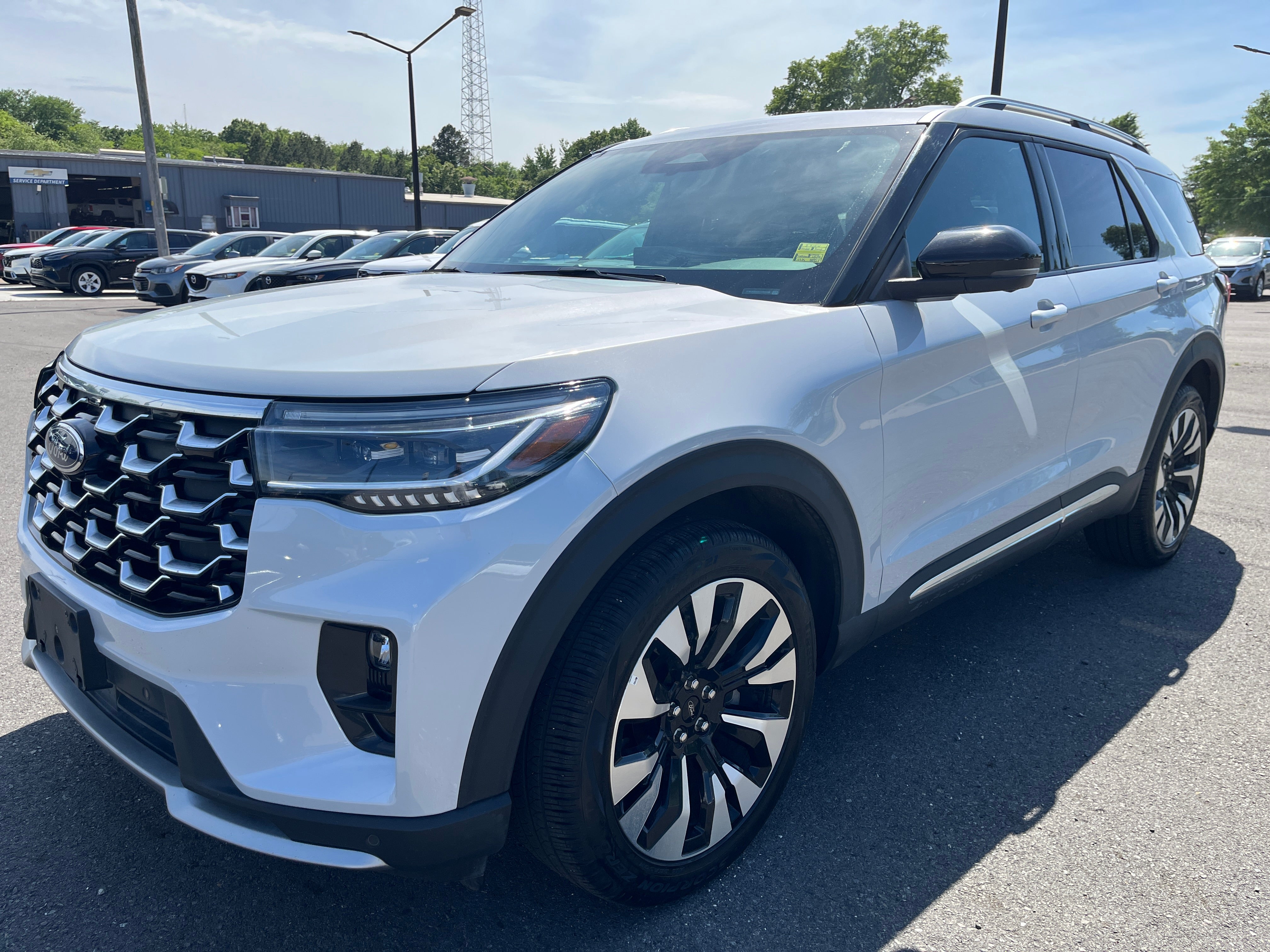 2025 Ford Explorer Platinum in White — front three-quarter view