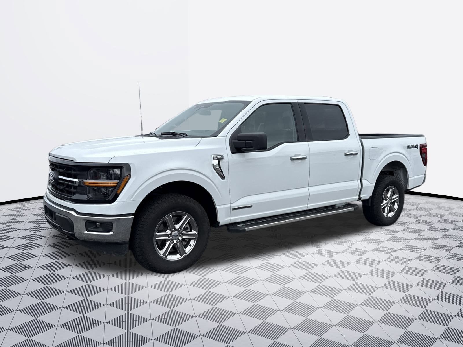 2025 Ford F-150 XLT in White — front three-quarter view