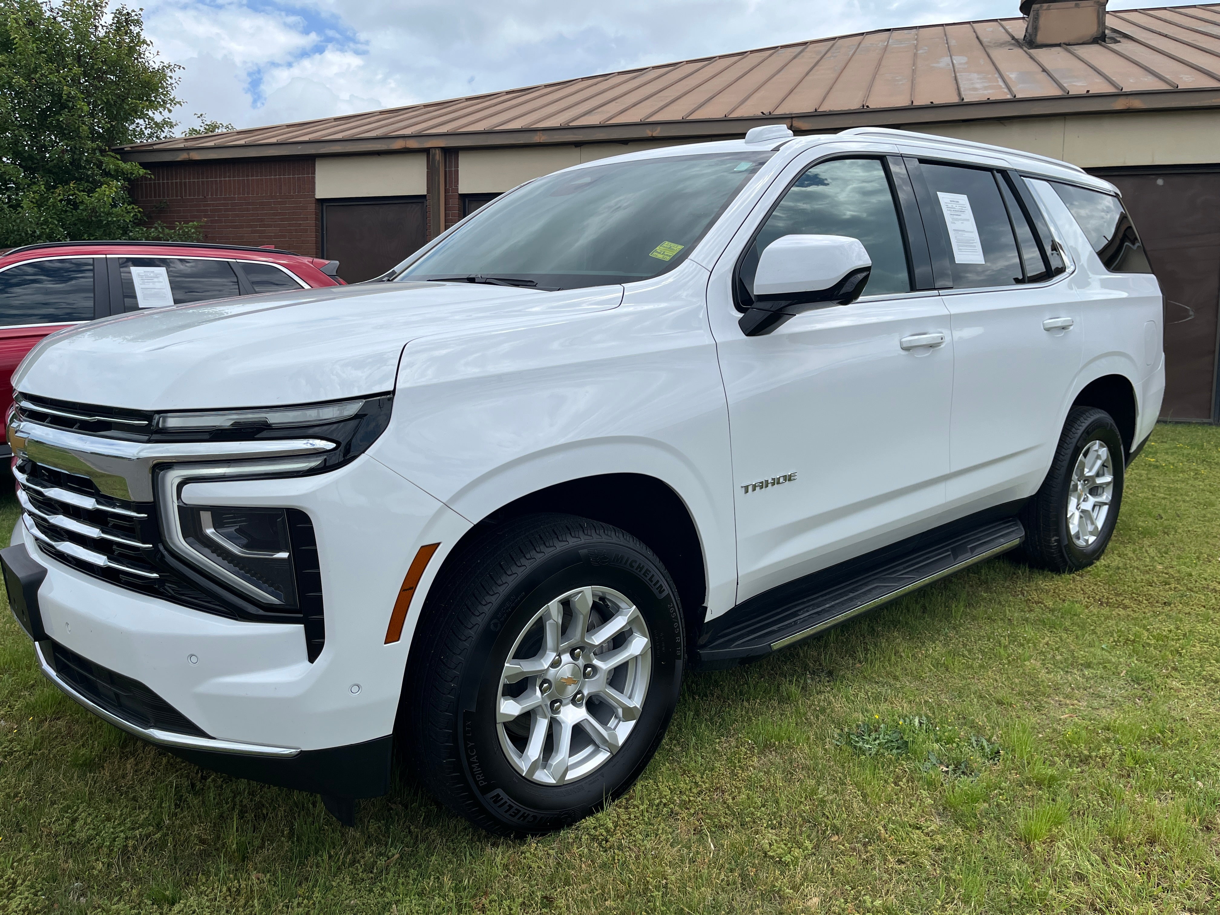 2025 Chevrolet Tahoe LT in Summit White — front three-quarter view