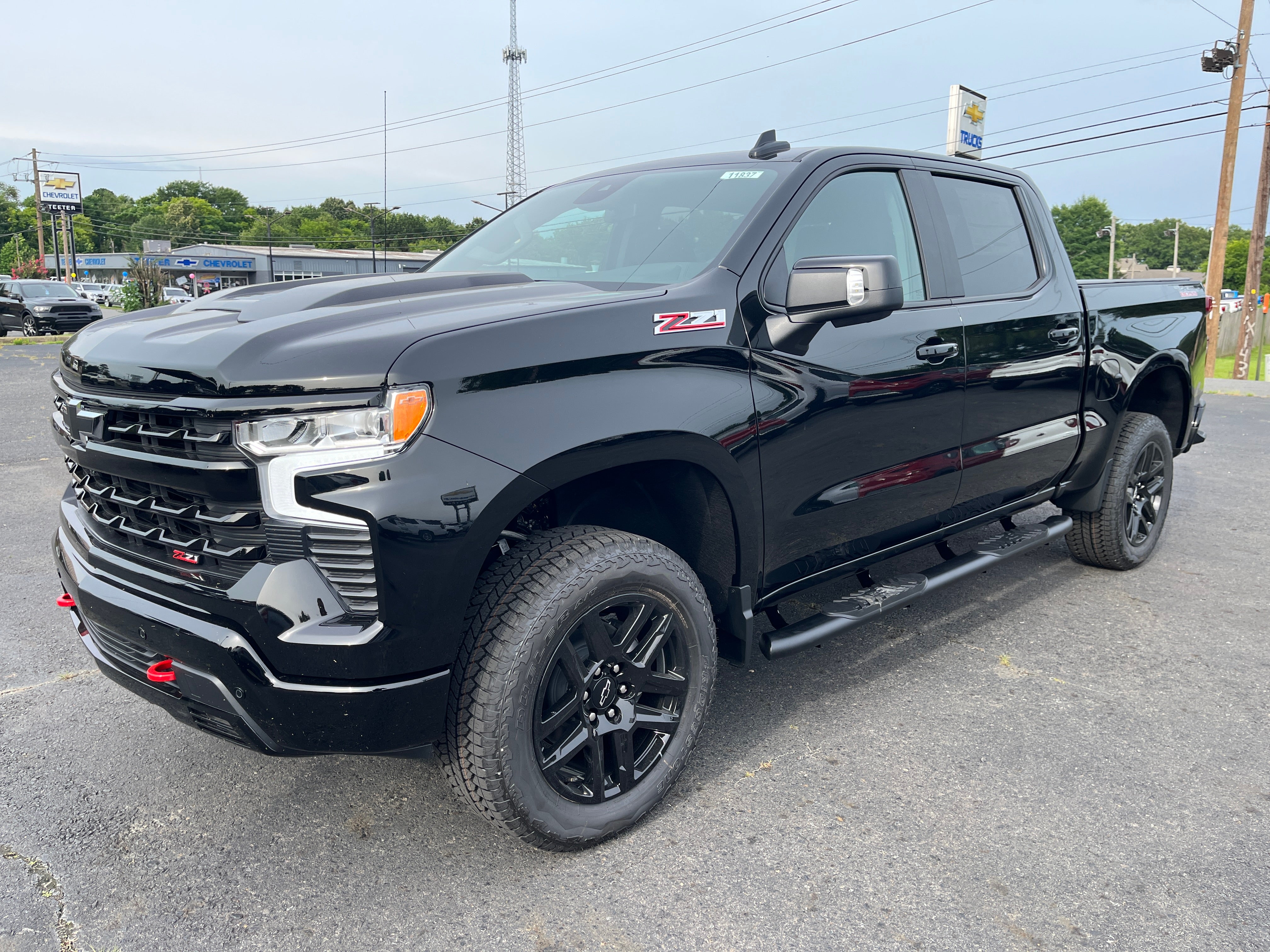 2026 Chevrolet Silverado 1500 LT Trail Boss in Black — front three-quarter view
