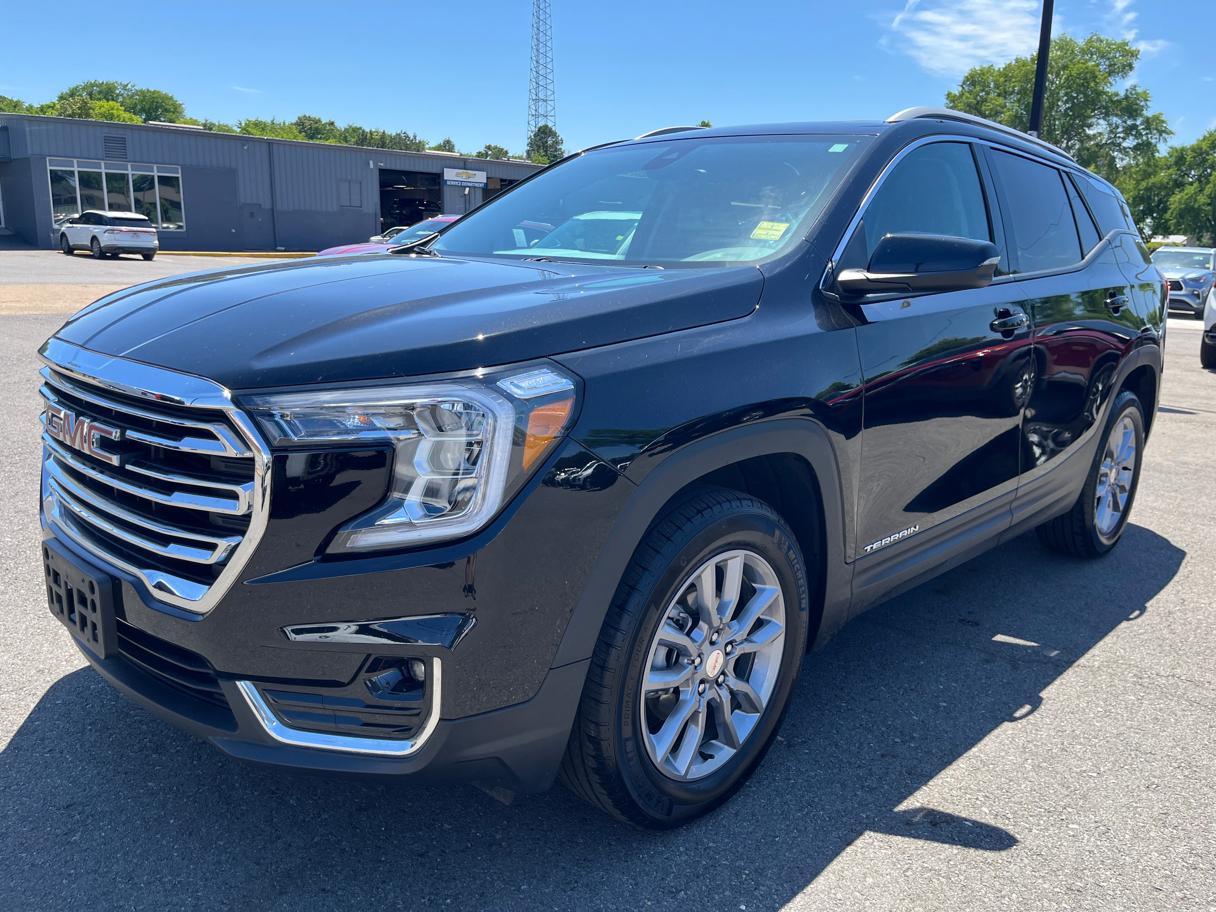 2024 GMC Terrain SLT in Ebony Twilight Metallic — front three-quarter view