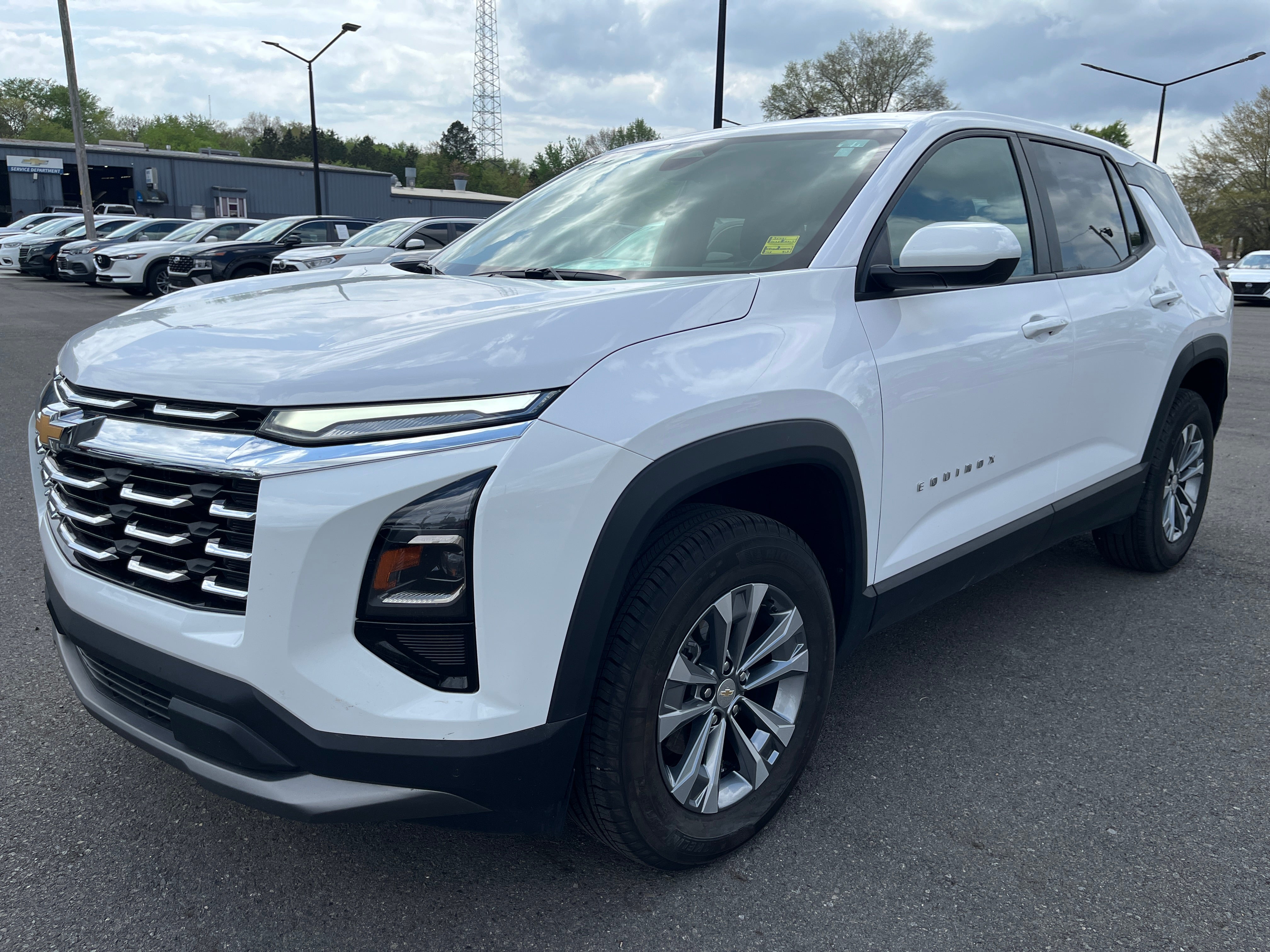 2025 Chevrolet Equinox LT in Summit White — front three-quarter view