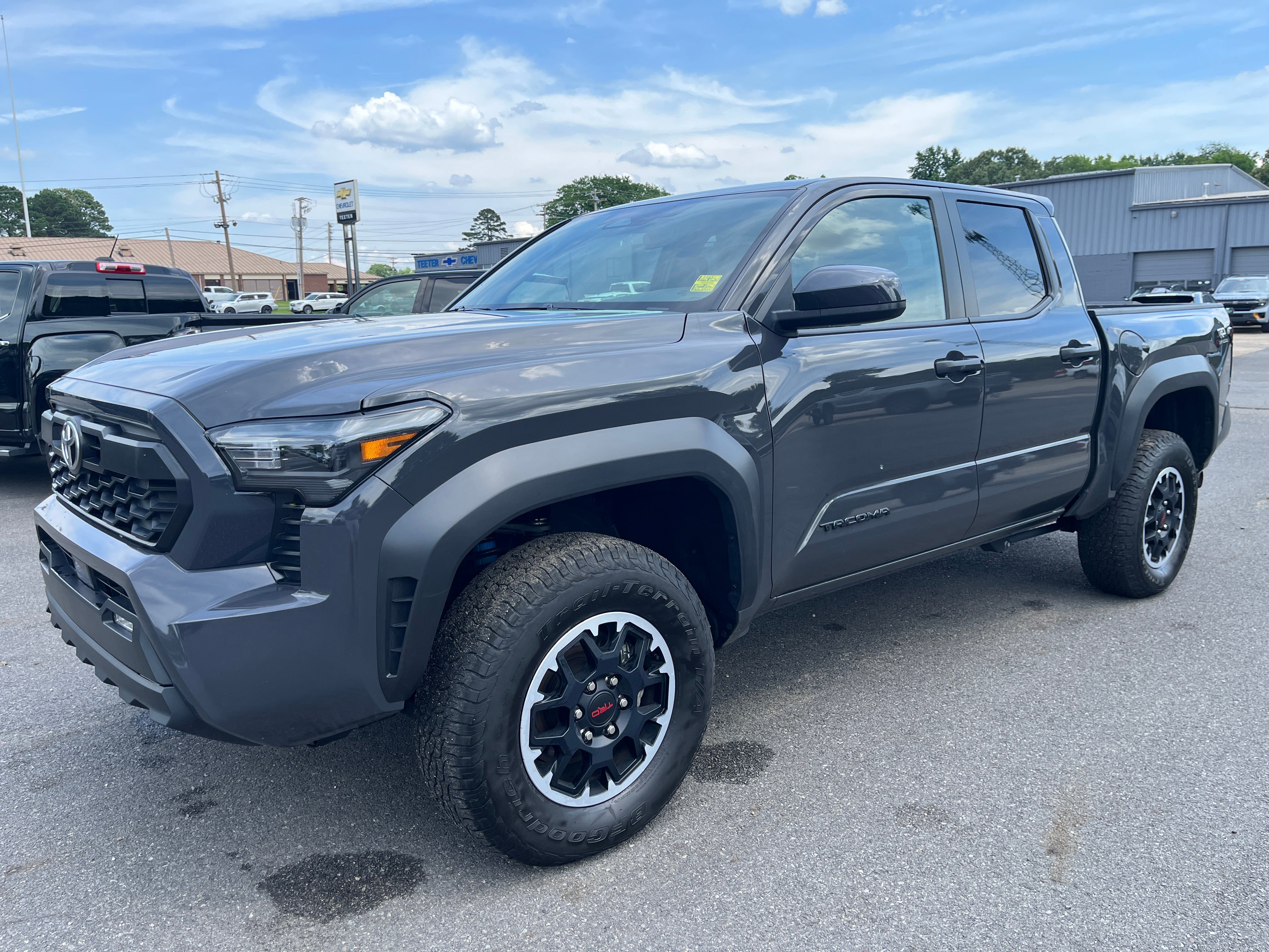 2025 Toyota Tacoma 4WD SR in Gray — front three-quarter view