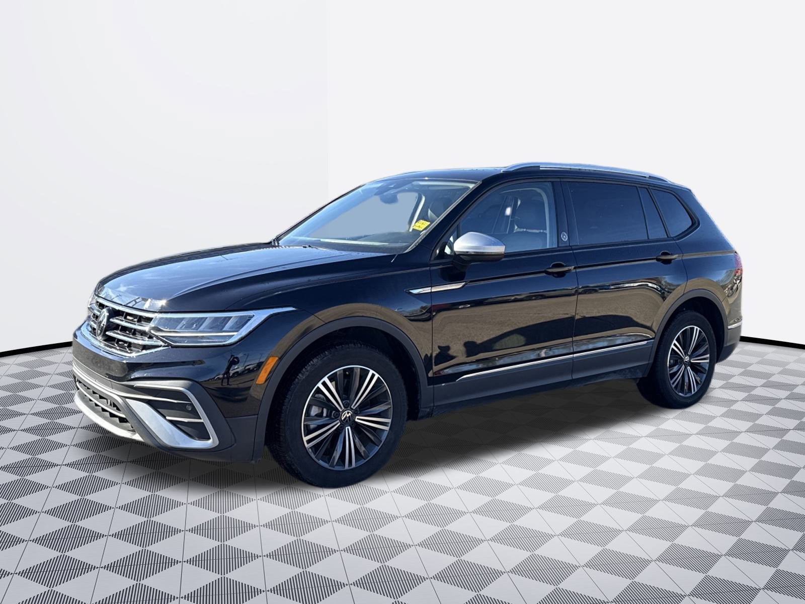 2024 Volkswagen Tiguan Wolfsburg Edition in Black — front three-quarter view