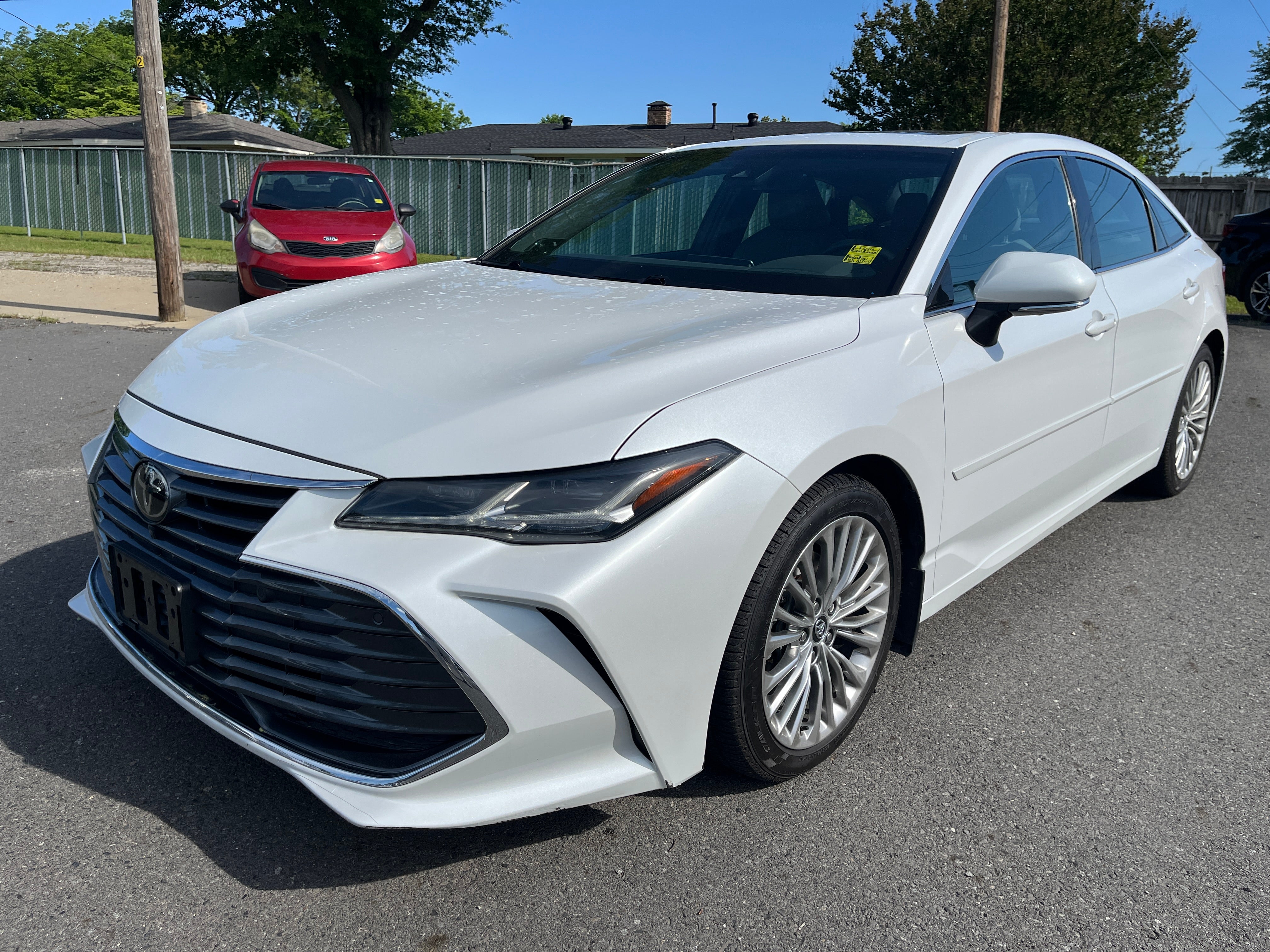 2020 Toyota Avalon Limited in Pearl — front three-quarter view
