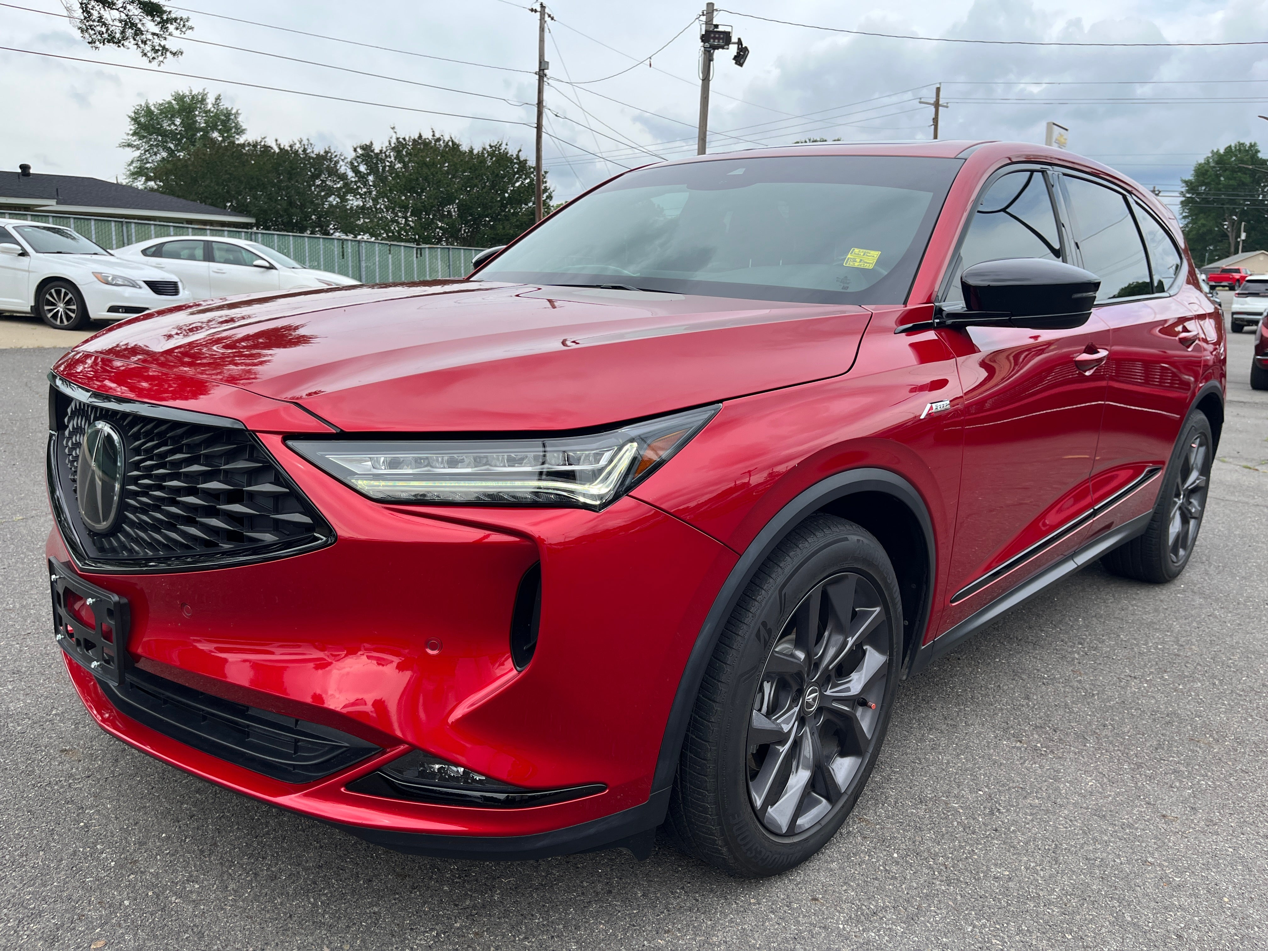 2024 Acura MDX w/A-Spec Package in Performanc — front three-quarter view