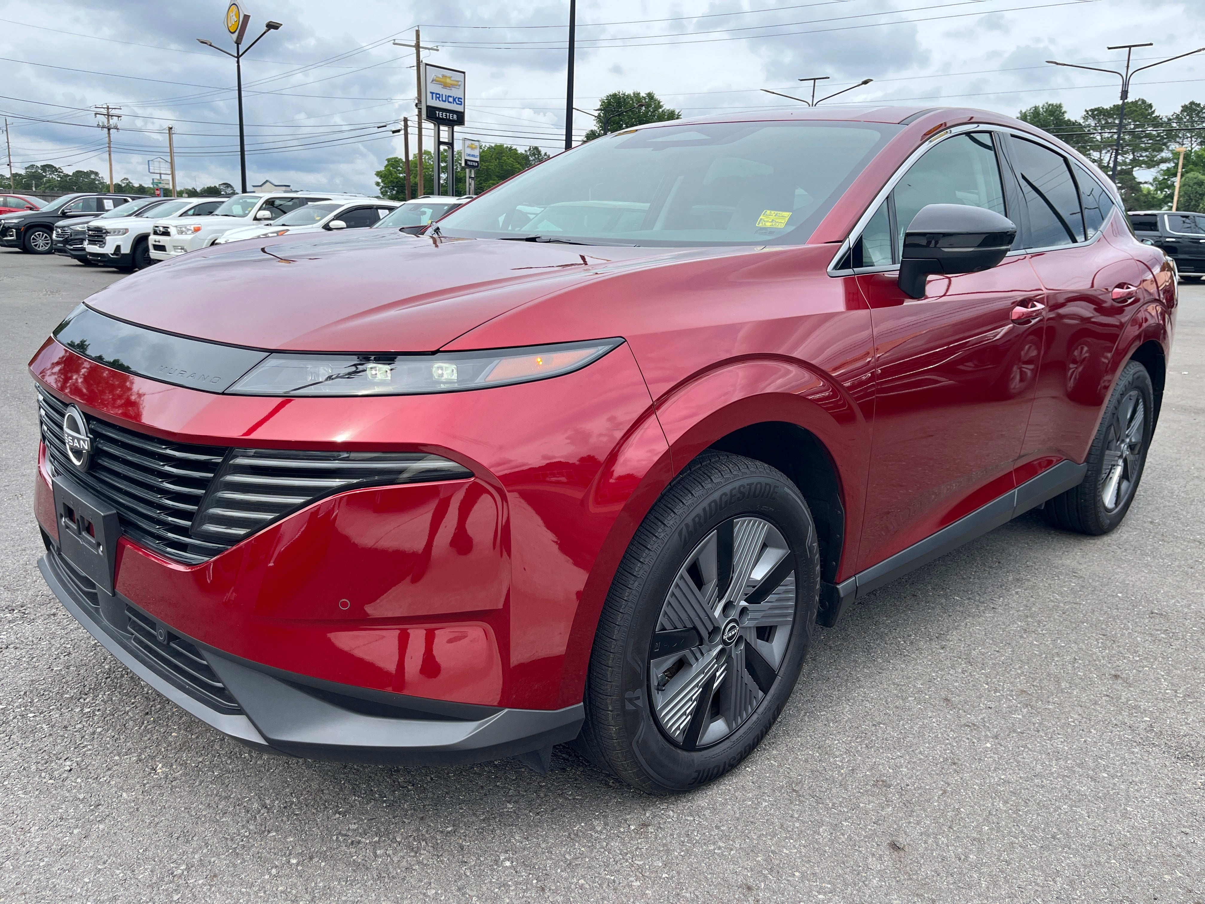 2025 Nissan Murano SL in Scarlet Em — front three-quarter view