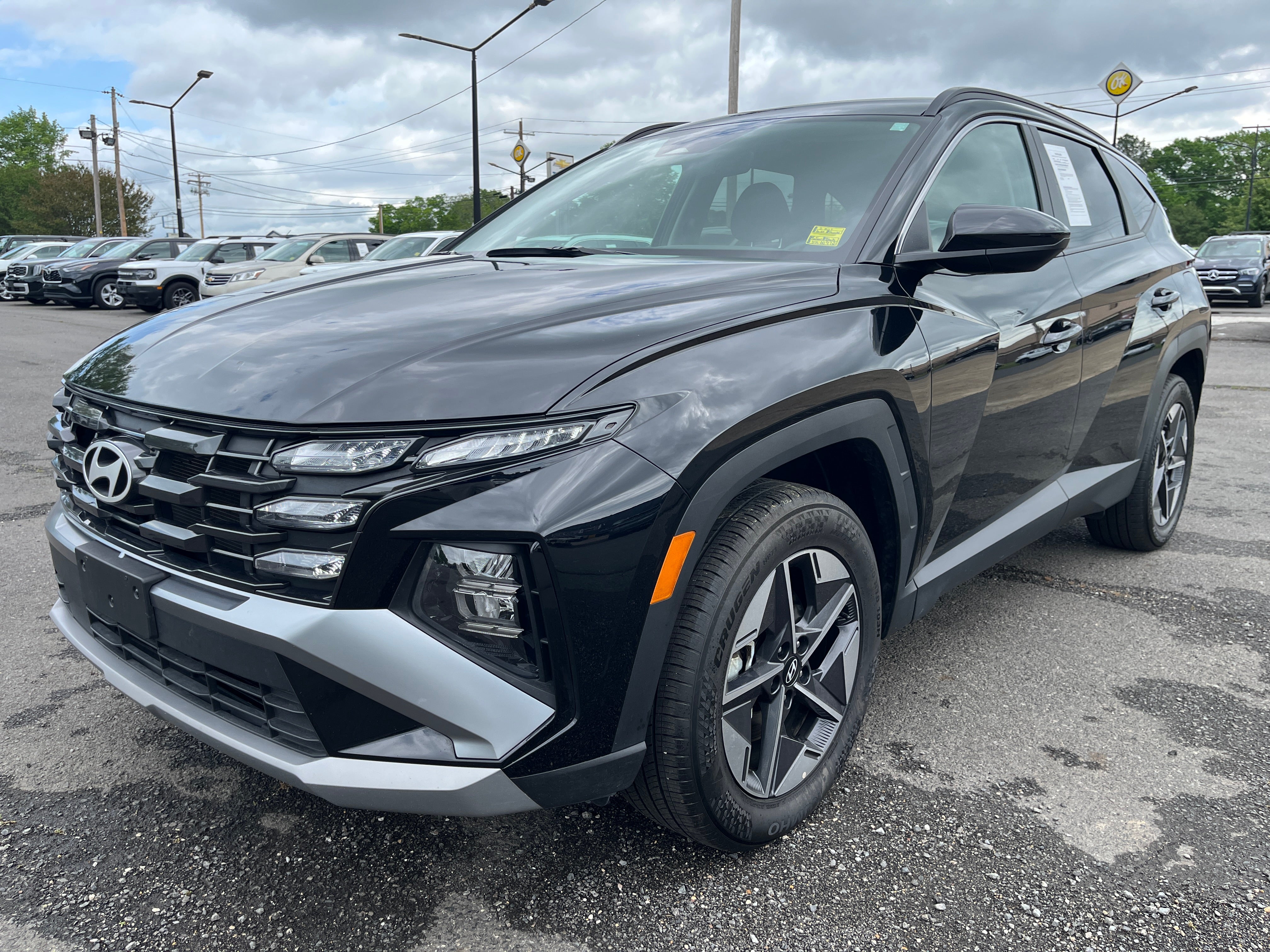 2025 Hyundai Tucson SEL in Phantom Bl — front three-quarter view