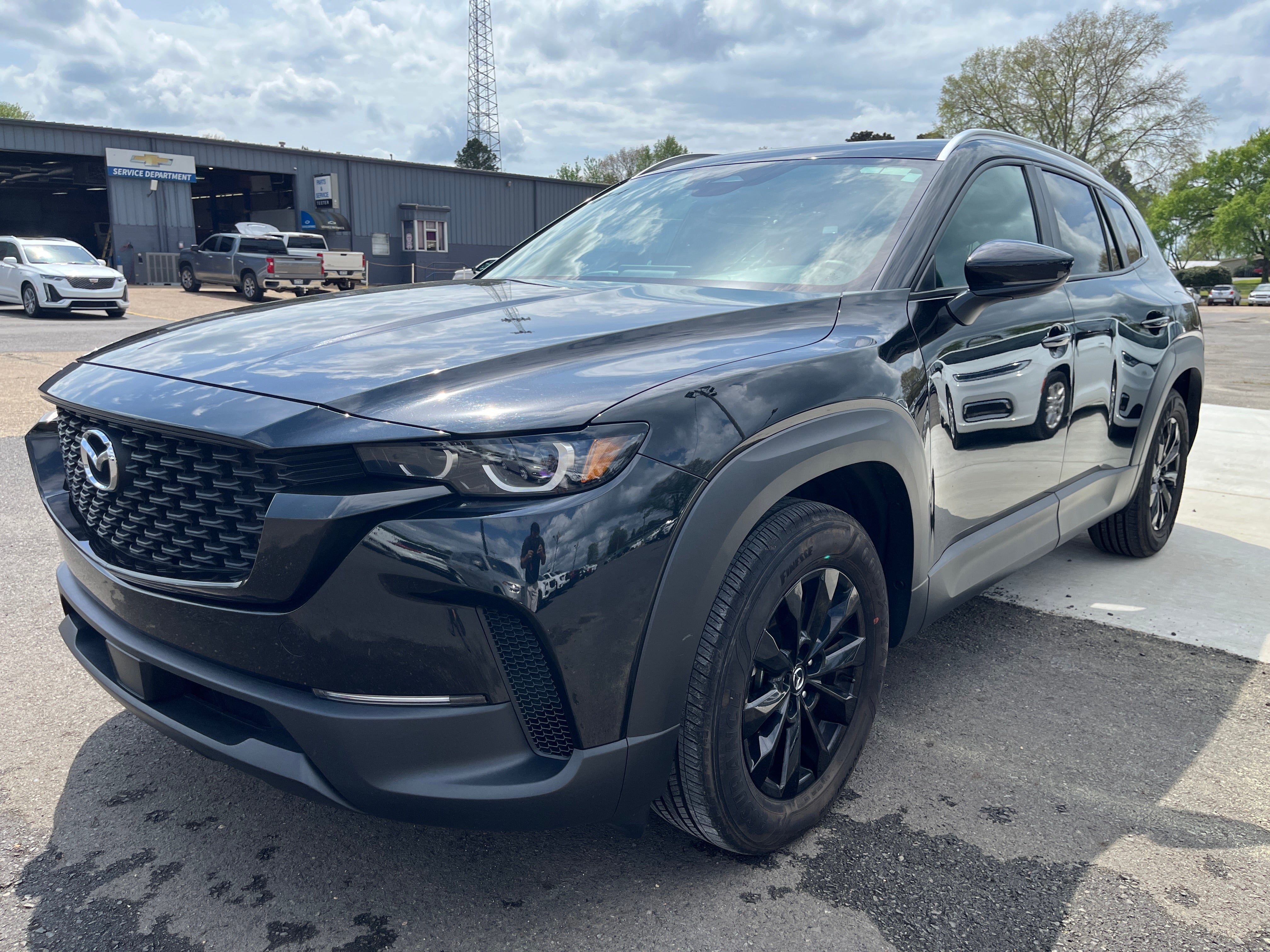2025 Mazda Mazda CX-50 2.5 S Premium Package in Black — front three-quarter view