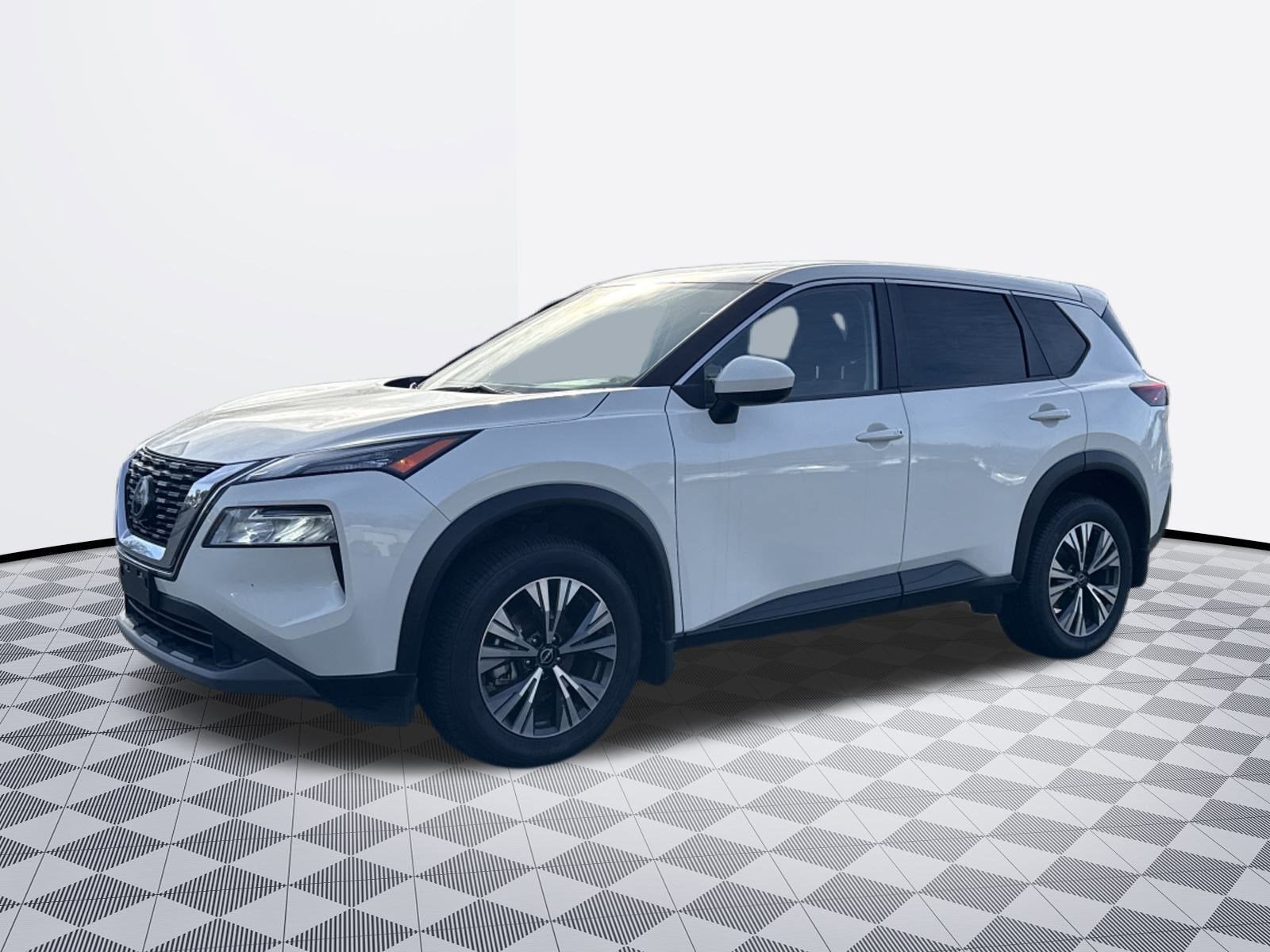 2023 Nissan Rogue SV in White — front three-quarter view