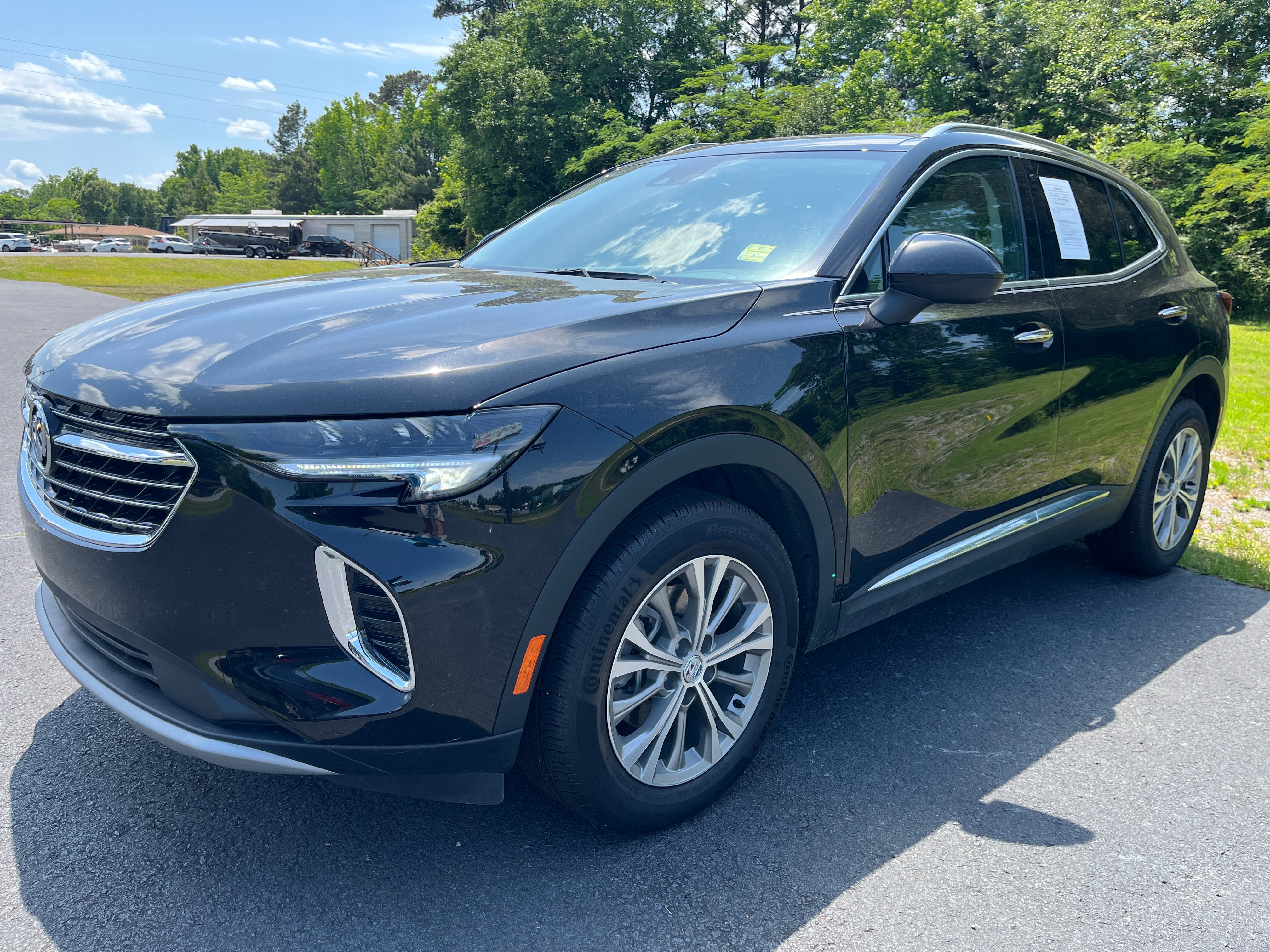 2023 Buick Envision Preferred in Ebony Twilight Metallic — front three-quarter view