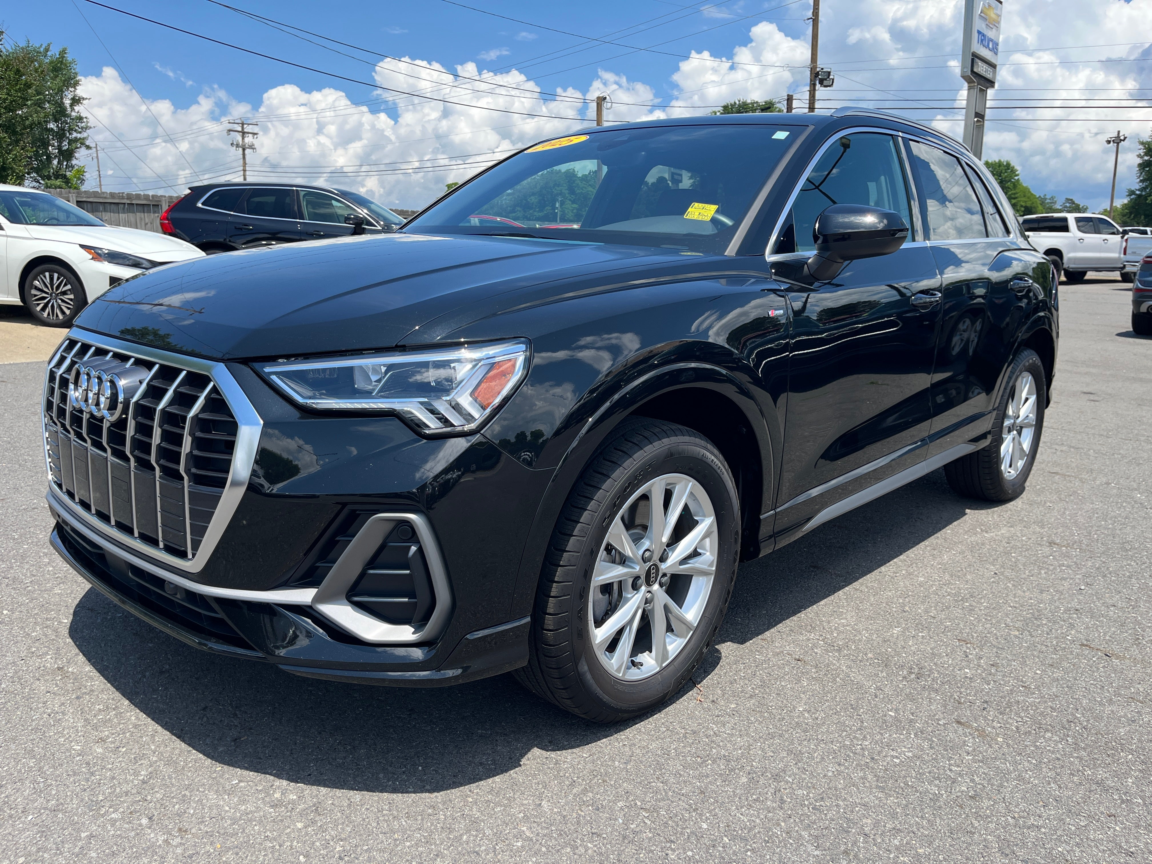 2025 Audi Q3 S line Premium in Black — front three-quarter view